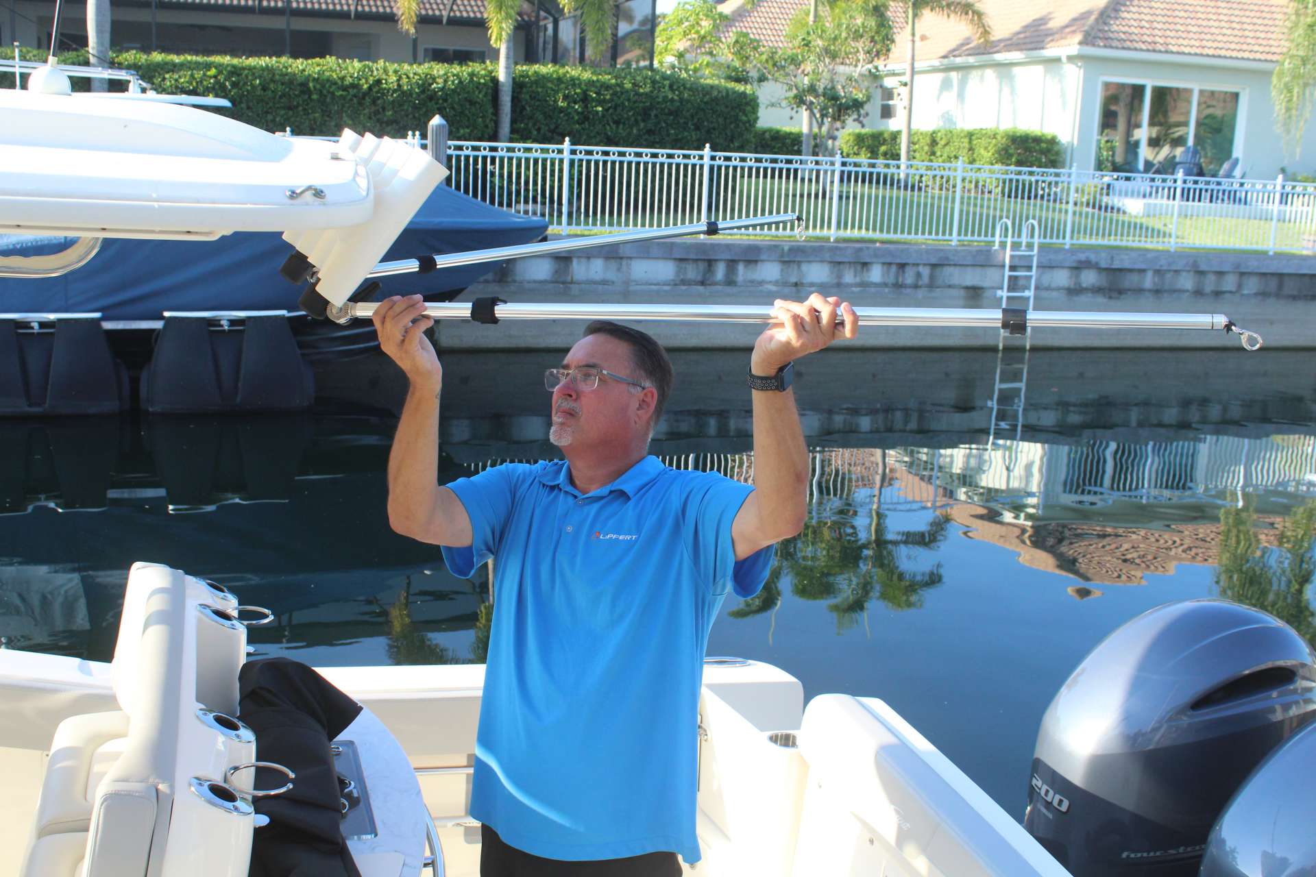 Rod holder boat shade installation